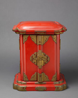 Painted and red lacquered wood