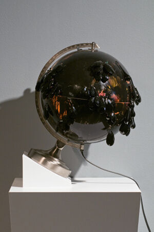 Plastic globe with light and chandelier crystals