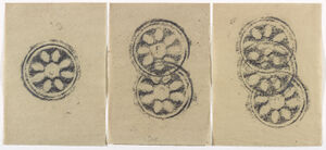 Graphite rubbing on East German paper